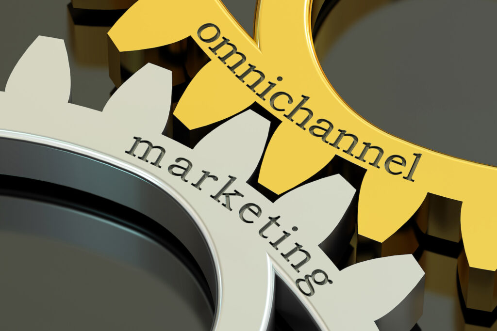 Image of omnichannel marketing concept on gearwheels.