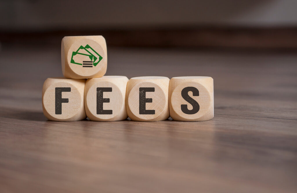 Image of wooden blocks that spell out the word fees.