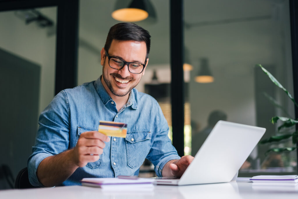 Image of a man online shopping.