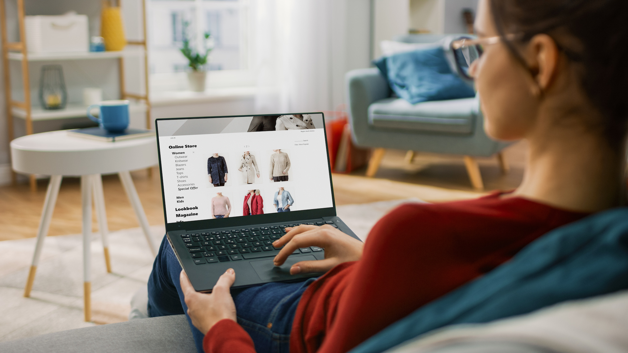 Image of a women at home, online shopping.